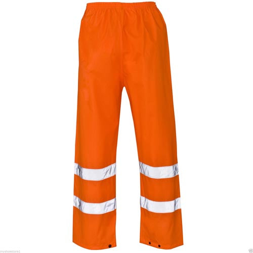 Orange safety pants with reflective stripes on a white background