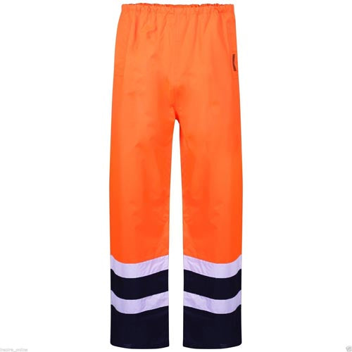 Orange safety pants with reflective stripes on a white background